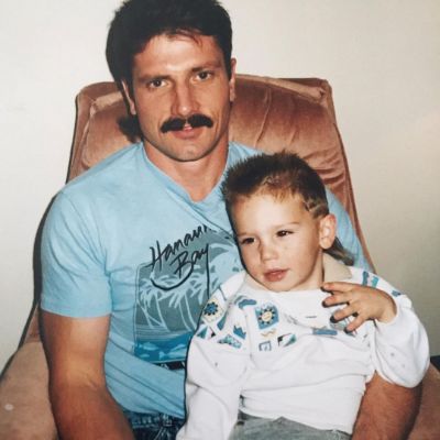 Photo of Tanner Novlan and his father, Doug Novlan. 